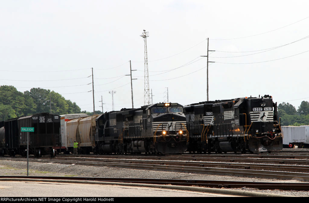NS 9485 & NS 6565 lead train E25 out of the yard